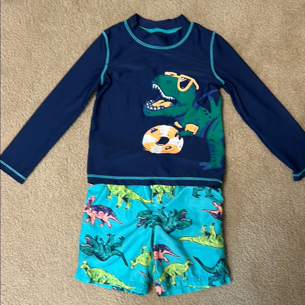 Dinosaur Print Kids Swim Set - Blue and Green
EUC
Smoke free/ pet friendly home